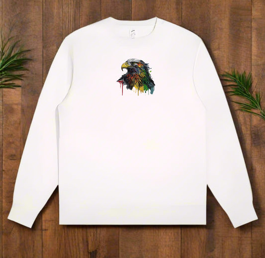 White long-sleeve sweatshirt with a colorful eagle design on a wooden surface.