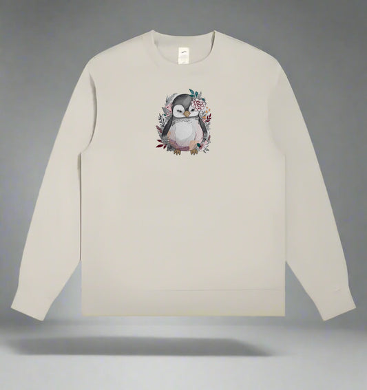 Mint green long-sleeve sweatshirt with a penguin design on a gray background
