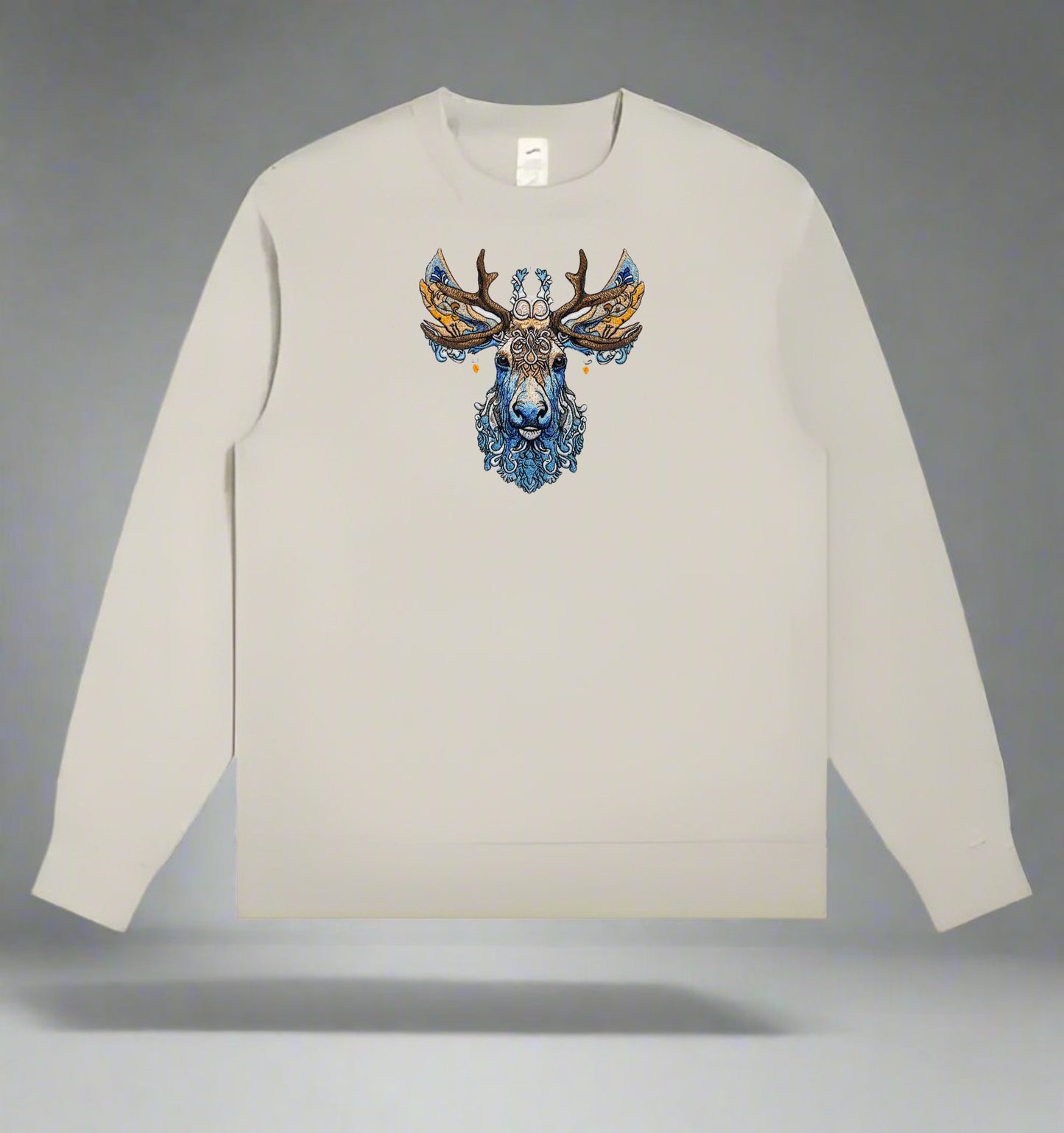 An embroidered image of a deer with intricate antlers and a detailed face featuring blue and brown colors.