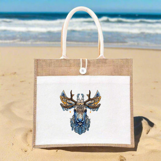 Embroidery of a deer with intricate floral patterns on a beige jute tote bag.