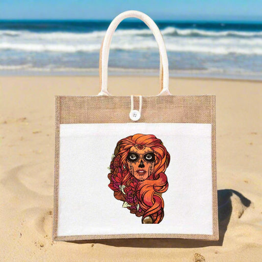 Embroidered jute tote bag featuring a whimsical character with red hair and floral elements.