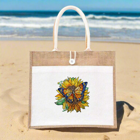Embroidered jute tote bag featuring a sunflower and butterfly design.