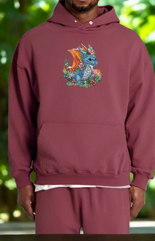 Embroidered hoodie featuring a mythical spring dragon with floral elements, in vibrant colors on a white background.