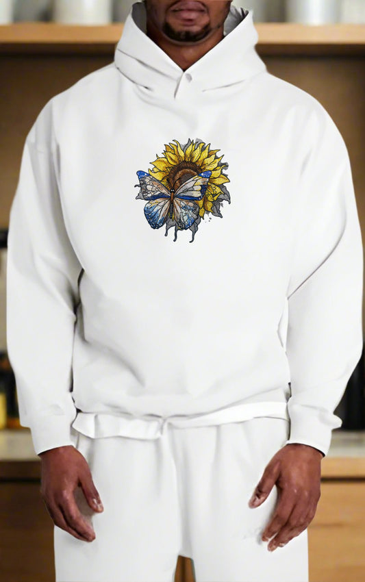 Embroidered sunflower and butterfly design on a hoodie