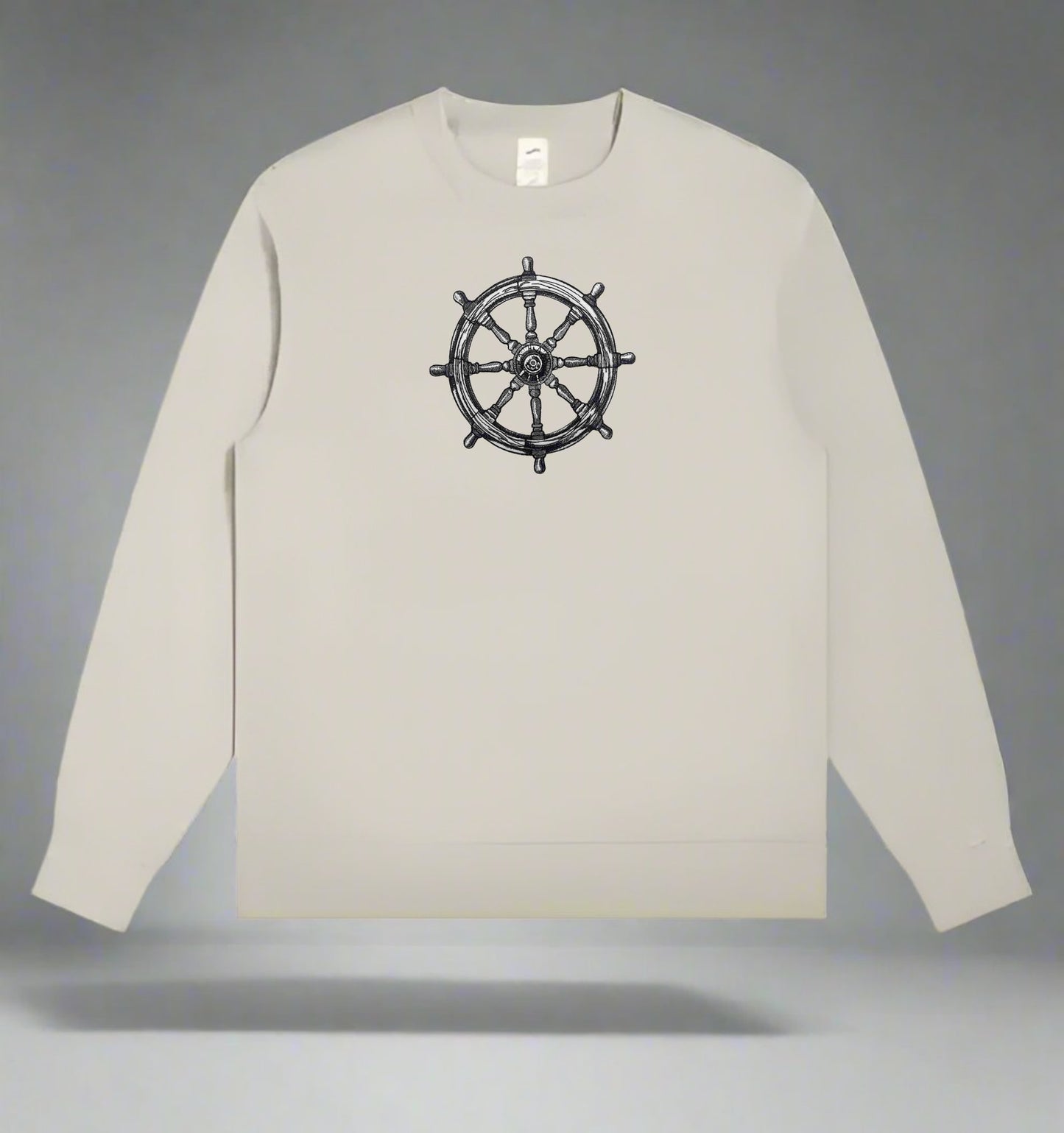 Embroidery of a traditional ship's wheel, typically found at the helm of a boat or ship.