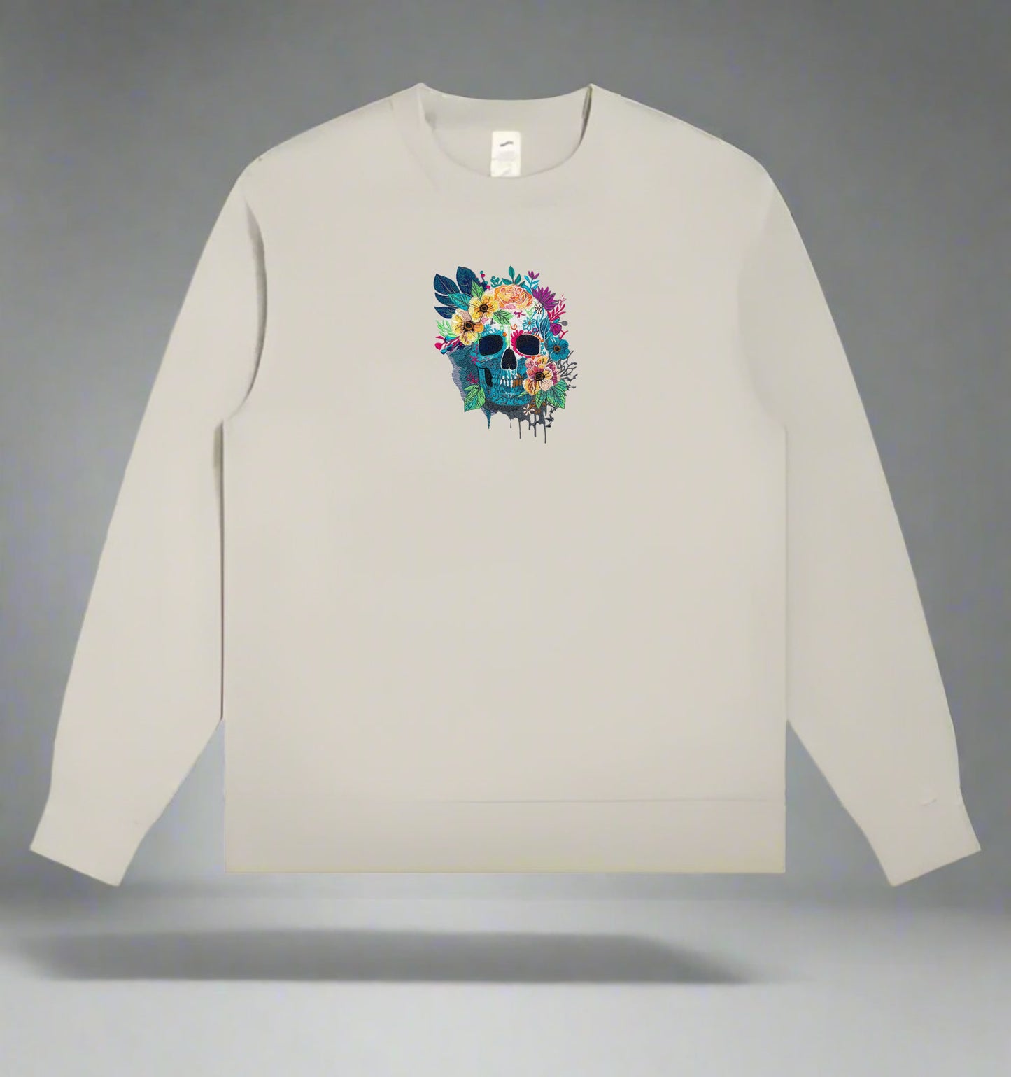 Mint Green long-sleeve Sweatshirt with a colorful skull design on a gray background