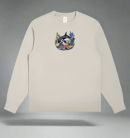 Beige long-sleeve sweatshirt with a dolphin and floral design on a gray background