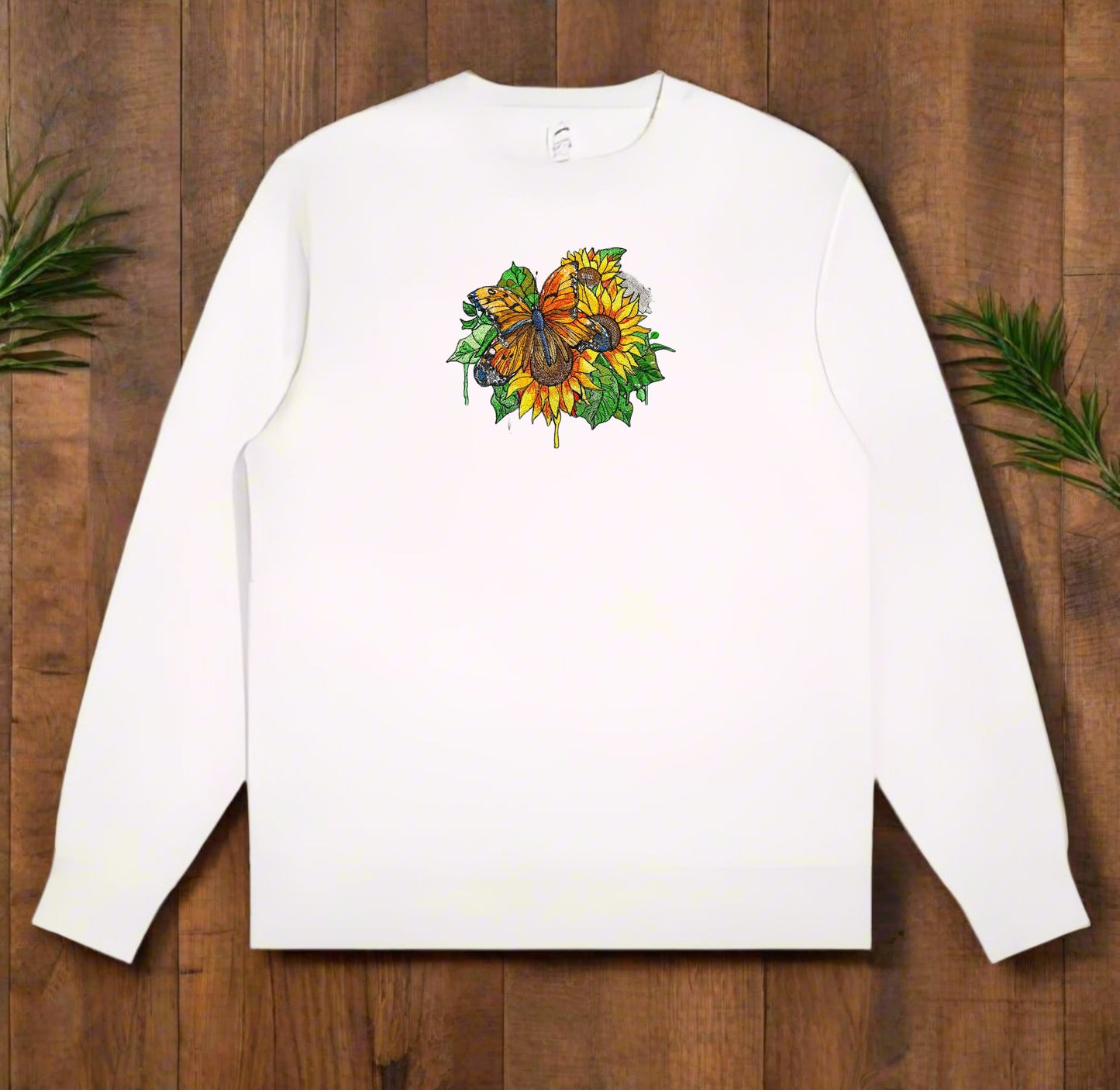 embroidered sweatshirt featuring a vibrant butterfly with detailed floral patterns on the front.