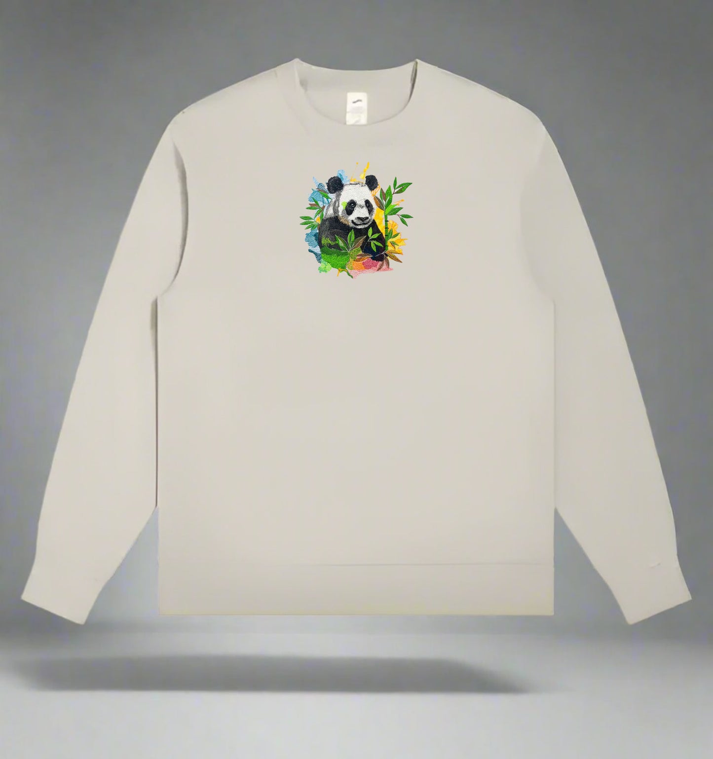 Mint green long-sleeve sweatshirt with a panda design on a gray background