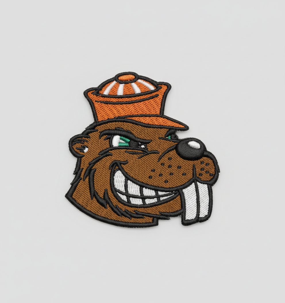Emblematic head of a beaver with an orange hat on a grid background