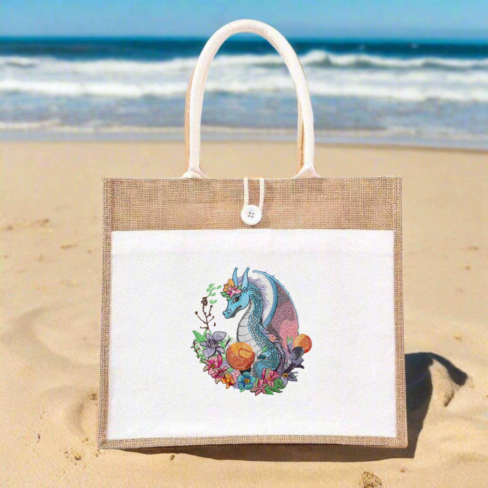 A colorful embroidered picture featuring a dragon surrounded by floral motifs.