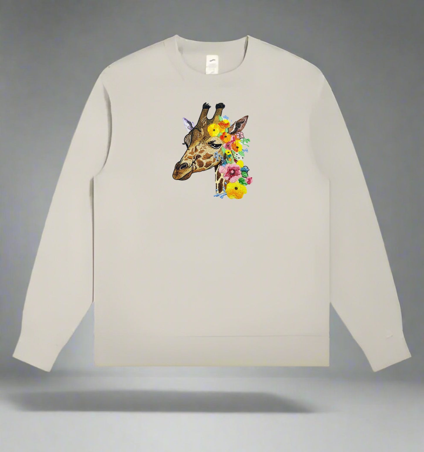 A embroidery design of a giraffe with a floral pattern.