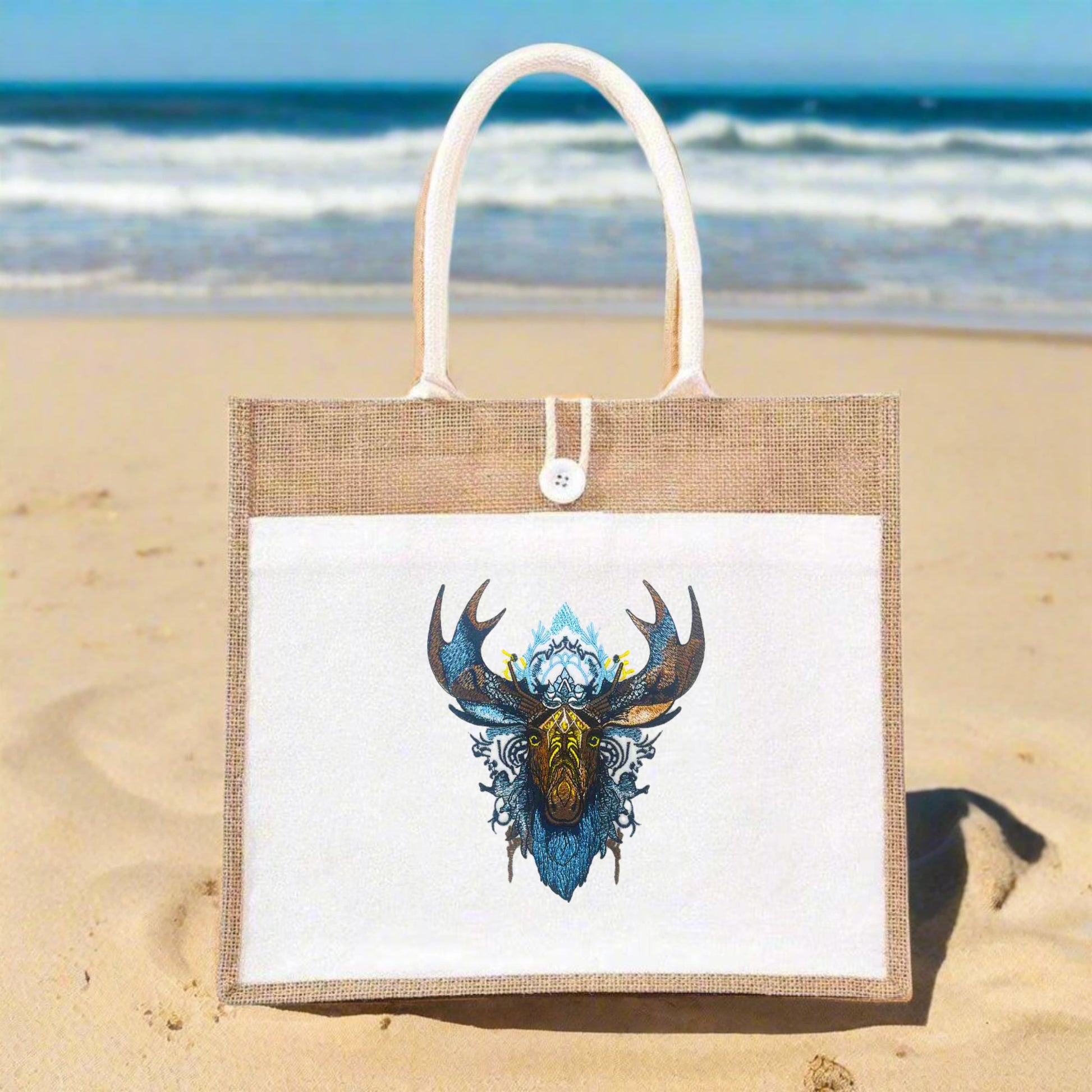 stitched tribal moose embroidery on a jute tote bag