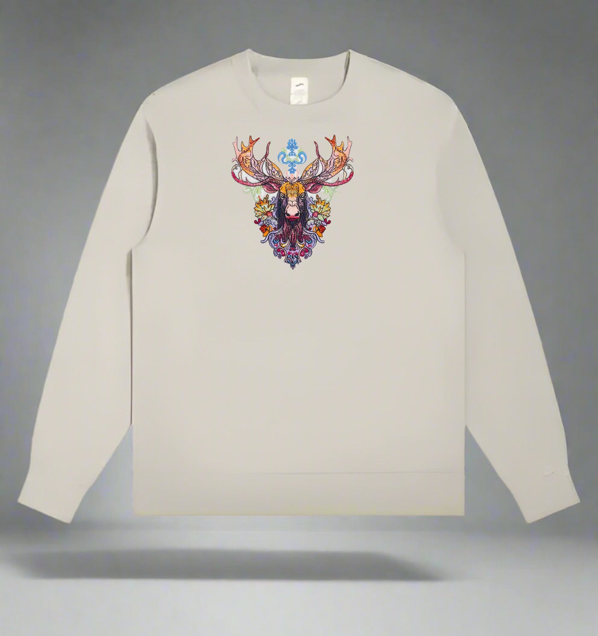 A detailed embroidered image of a moose with wildflowers on a sweatshirt.