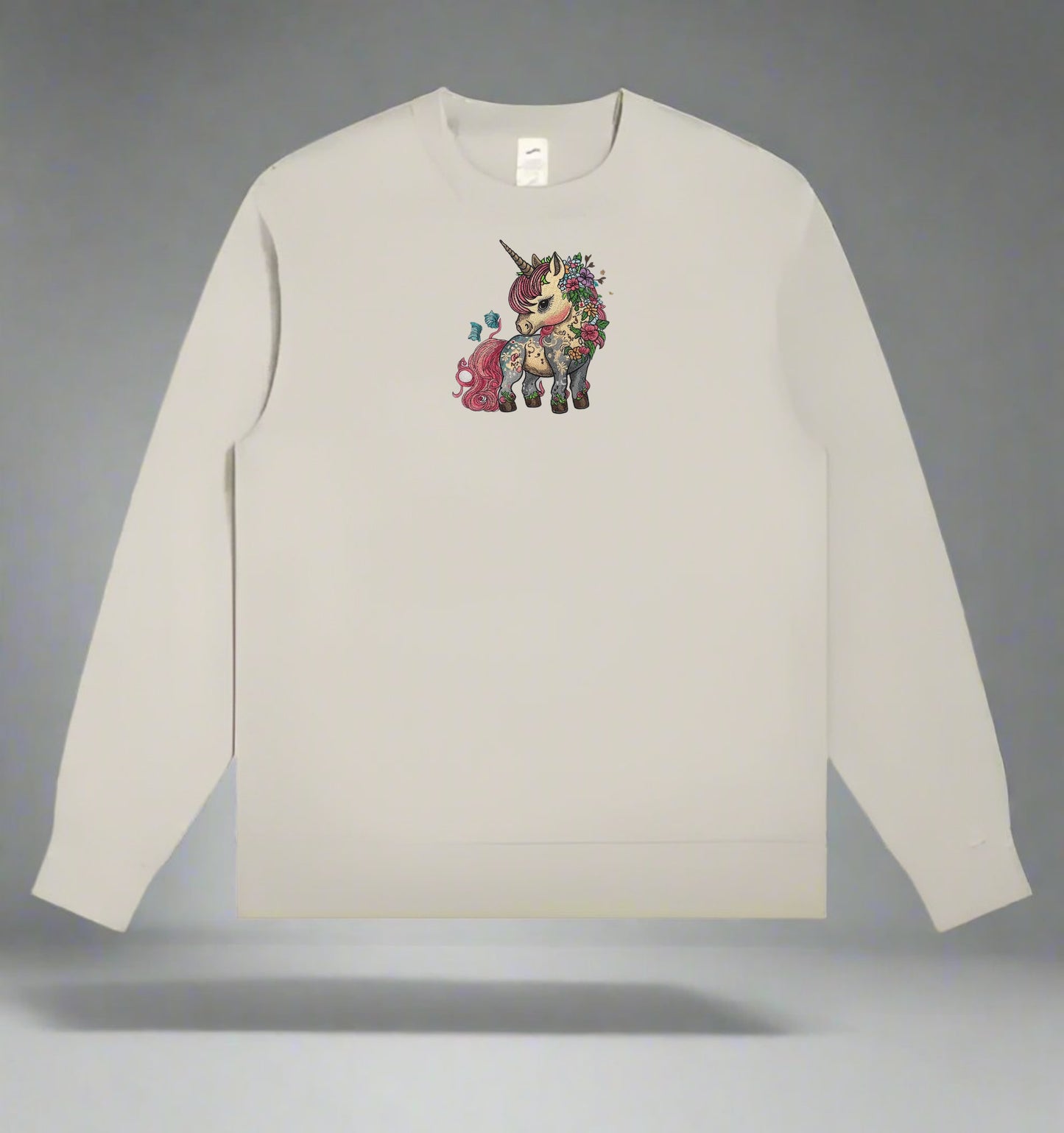 Mint Green  long-sleeve sweatshirt with a colorful  Enchanted Floral Unicorn Embroidery on a gray background