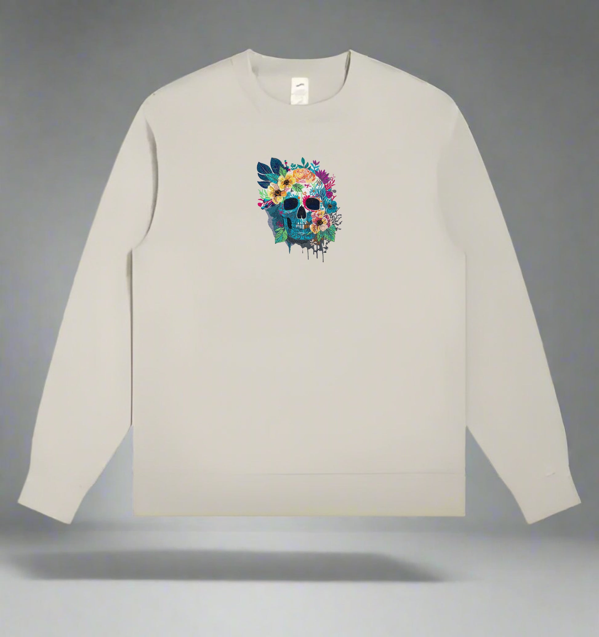 Mint Green long-sleeve Sweatshirt with a colorful skull design on a gray background