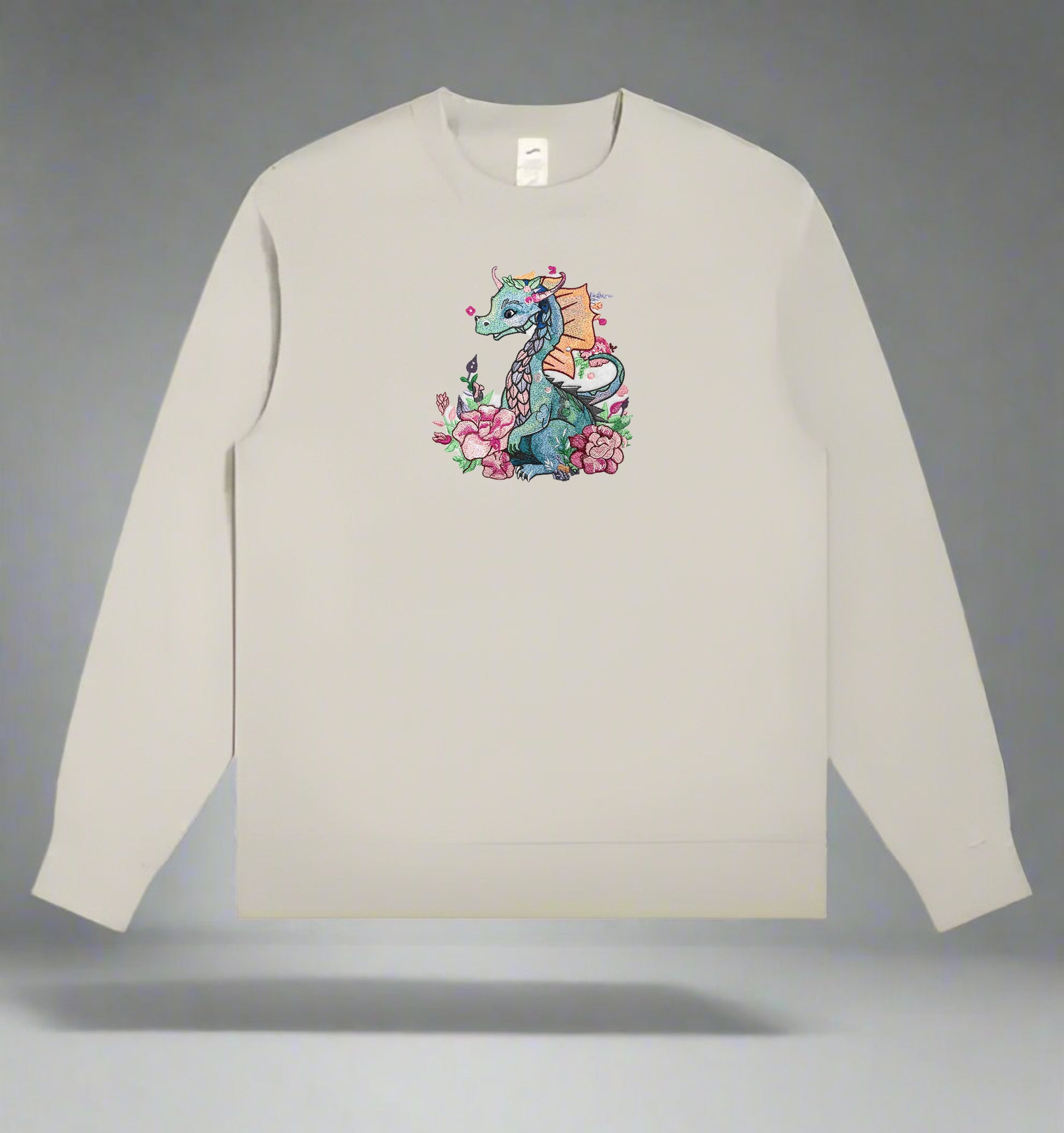 An embroidery design of a colorful dragon surrounded by floral elements and a detailed description of the design is presented.