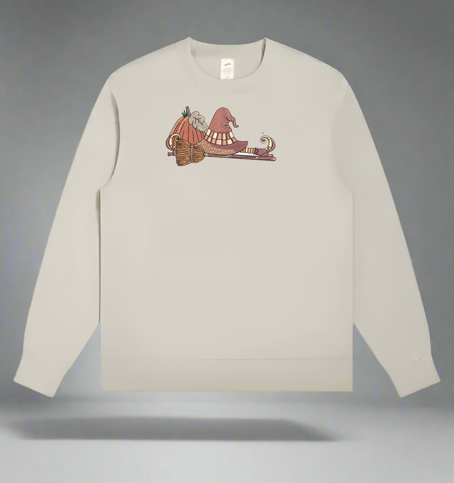 mint green  long-sleeve shirt with a graphic design on a gray background