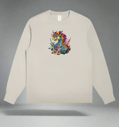 A colorful embroidery design of a dragon with floral elements and a detailed mane and tail.