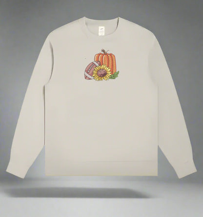 Mint Green long-sleeve sweatshirt with a pumpkin and sunflower design on a gray background
