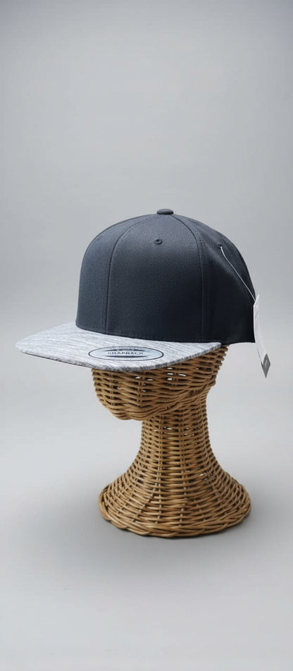 Blue cap on a wicker stand with a blurred background
