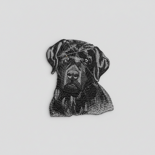 Black Labrador of a dog's head on a grid background