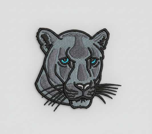 Embroidered patch of a black  panther head on a grid background