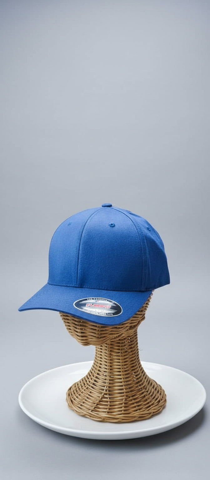 Blue cap on a wicker stand with a blurred indoor background
