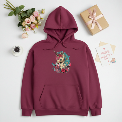 Burgundy hoodie mockup featuring an embroidered floral unicorn design on the chest, styled flat lay with roses, a gift box, and a Mother’s Day card.