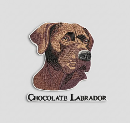 Embroidered patch of a chocolate Labrador on a grid background