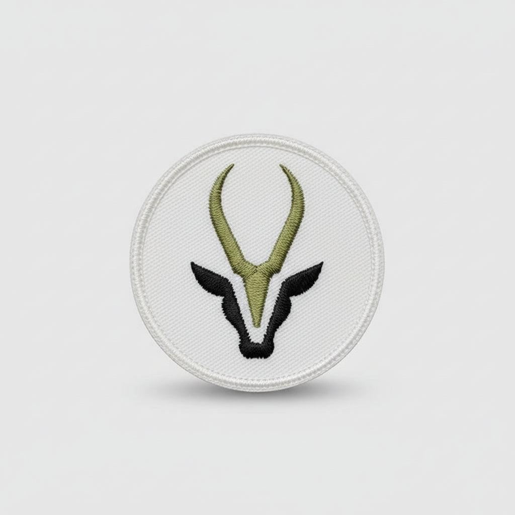Logo with black antelope head and gold antlers on a white background
