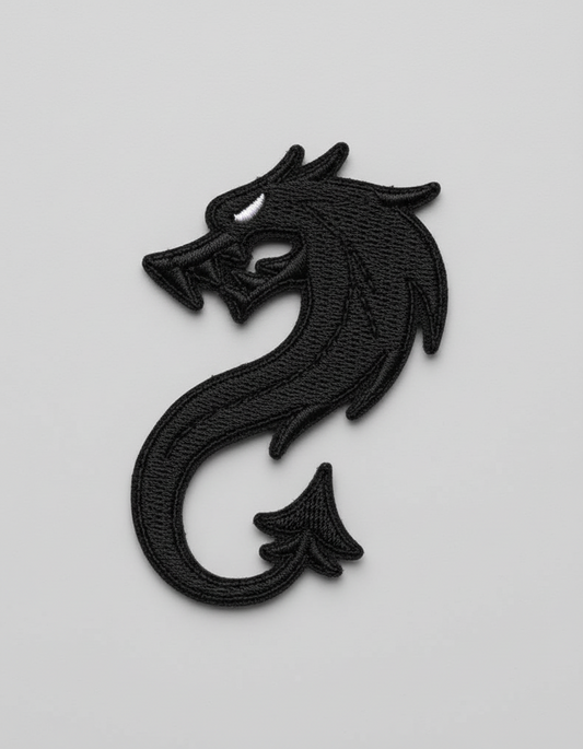 Black dragon silhouette on a grid background