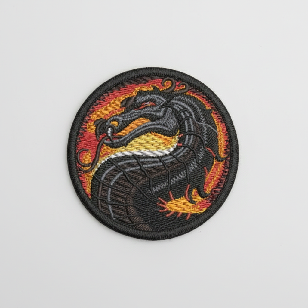 Embroidered patch with a dragon design on a grid background