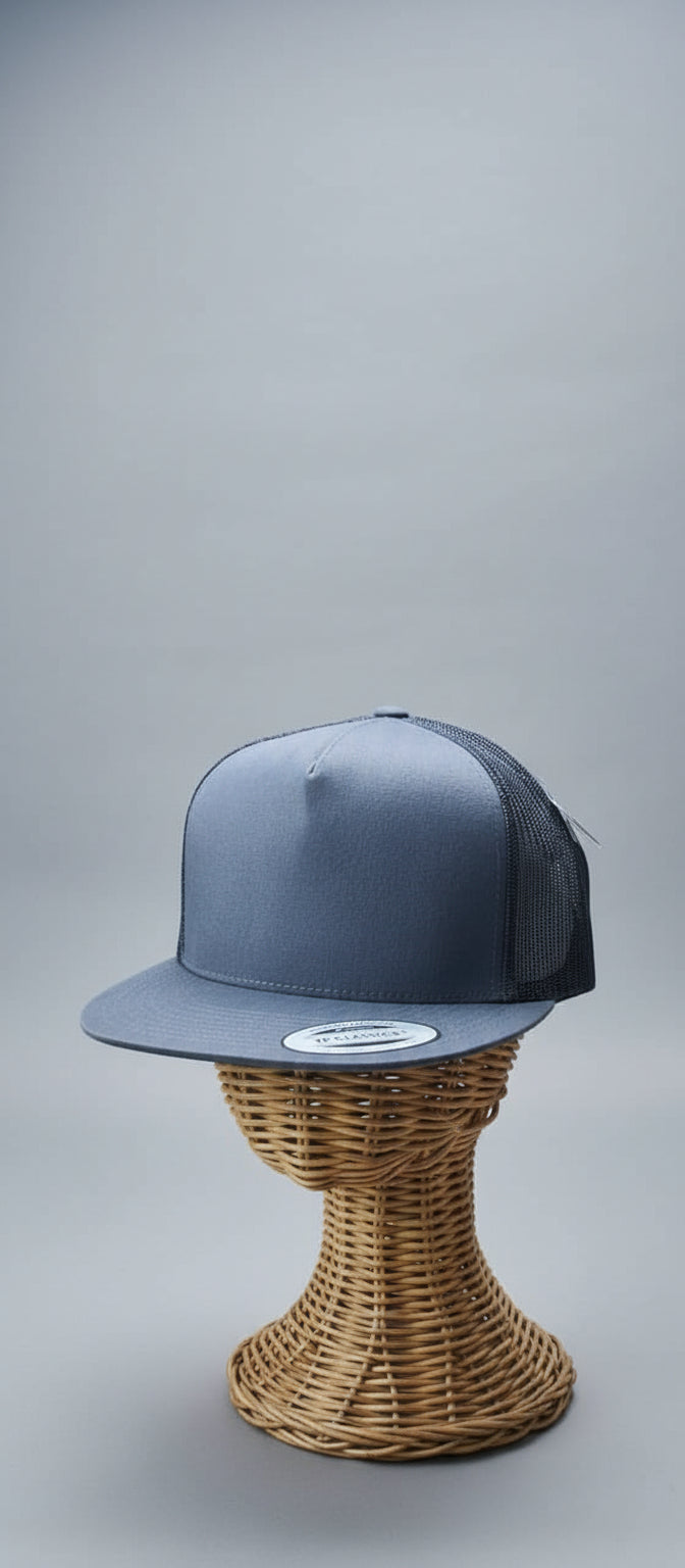 Blue cap on a mannequin head with a blurred background