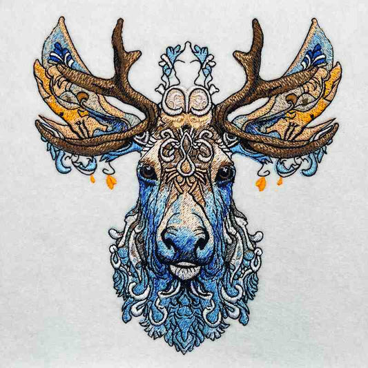 An embroidered design  of a deer with intricate antlers and a detailed face featuring blue and brown colors.
