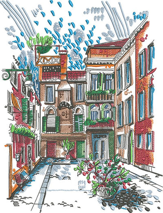 Detailed urban alley embroidery design featuring a colorful hand-drawn cityscape with tall buildings, windows and balconies, potted plants, cobblestone street, and blue sky accents, stitched in red, teal, green, and brown tones on a light background, original EmbroMania artwork.