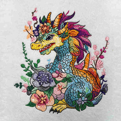 A colorful embroidered art piece depicting a dragon surrounded by floral designs, crafted on eco-friendly jute using organic threads.