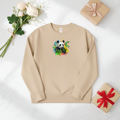 Beige unisex crewneck sweatshirt with vivid panda and bamboo embroidery design, flat lay with roses and gift boxes on white background.