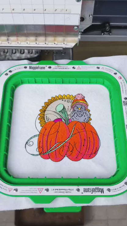 Embroidered fall design featuring a large pumpkin with swirling vines, a sunflower, and a cute bird in a hat—perfect for hoodies, sweatshirts, and tote bags.