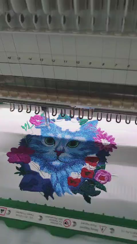 embroidering a floral cat face 