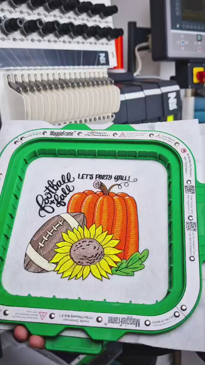 Embroidery machine stitching a football, pumpkin, and sunflower fall design with “Football Fall” text, ending with the Embromania logo.